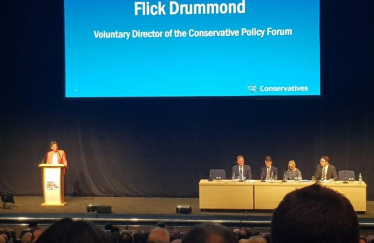 Flick speaking at the National Convention